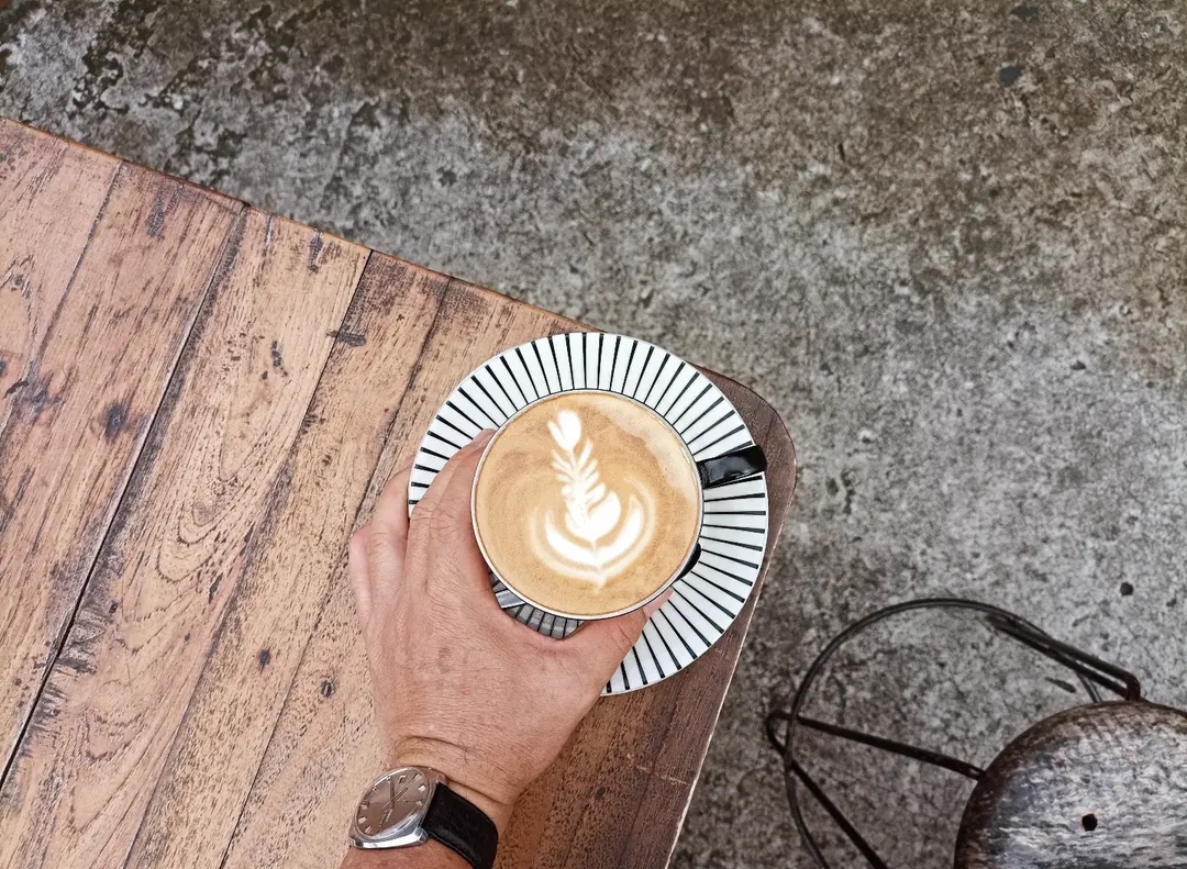 Latte art on a wooden table